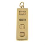 A 9ct gold ingot pendant.