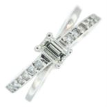 A rectangular-shape diamond single stone ring, with brilliant-cut diamond shoulders.
