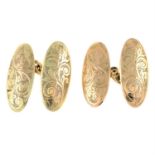 A pair of Edwardian 9ct gold oval-shape cufflinks, with foliate engraving.