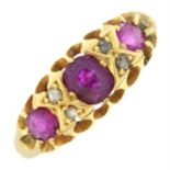 An 18ct gold ruby three-stone ring with rose-cut diamond spacers.