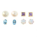 Four pairs of gem-set stud earrings.