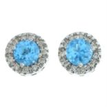 A pair of topaz and brilliant-cut diamond cluster earrings.