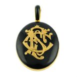 A late Victorian gold black enamel mourning locket, with initial monogram.