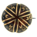 A Victorian gold inlay tortoise shell floral motif brooch.