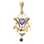 An Edwardian 9ct gold amethyst and split pearl openwork heart motif drop pendant.