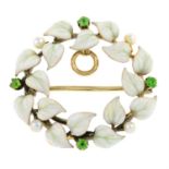 A Belle Époque gold enamel, seed pearl and green garnet brooch/pendant.