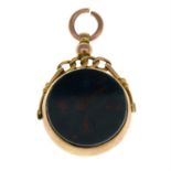 An early 20th century gold bloodstone and carnelian swivel fob.