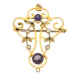 An Edwardian 9ct gold amethyst and split pearl openwork pendant / brooch.