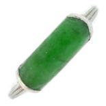 A jade single-stone dress ring.