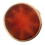 A reverse carved carnelian intaglio signet ring.