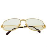 CARTIER - a pair of prescription glasses.