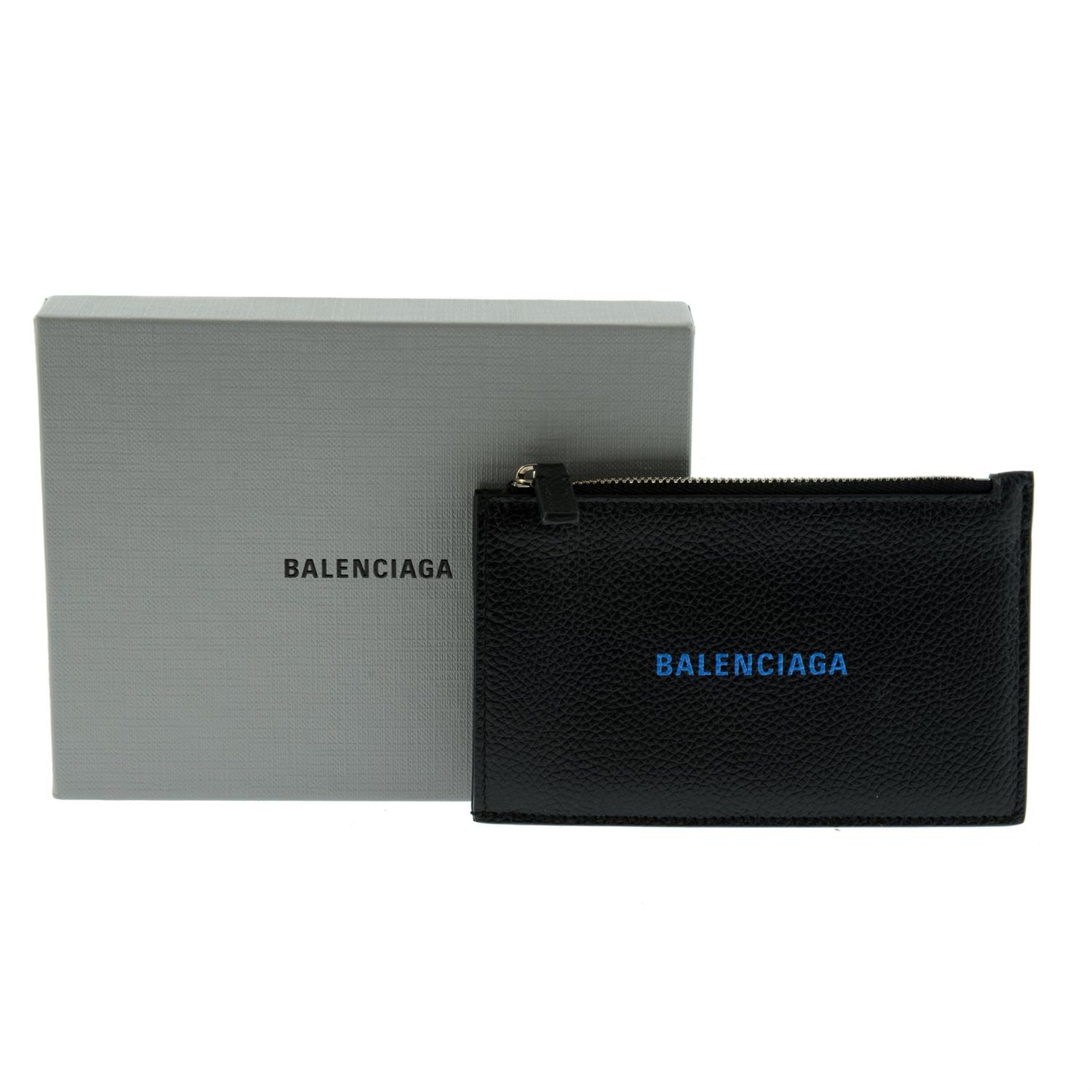 BALENCIAGA - a black leather card wallet.
