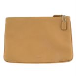 COACH - a brown leather pouch.