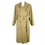 BURBERRY - a beige belted trench coat.