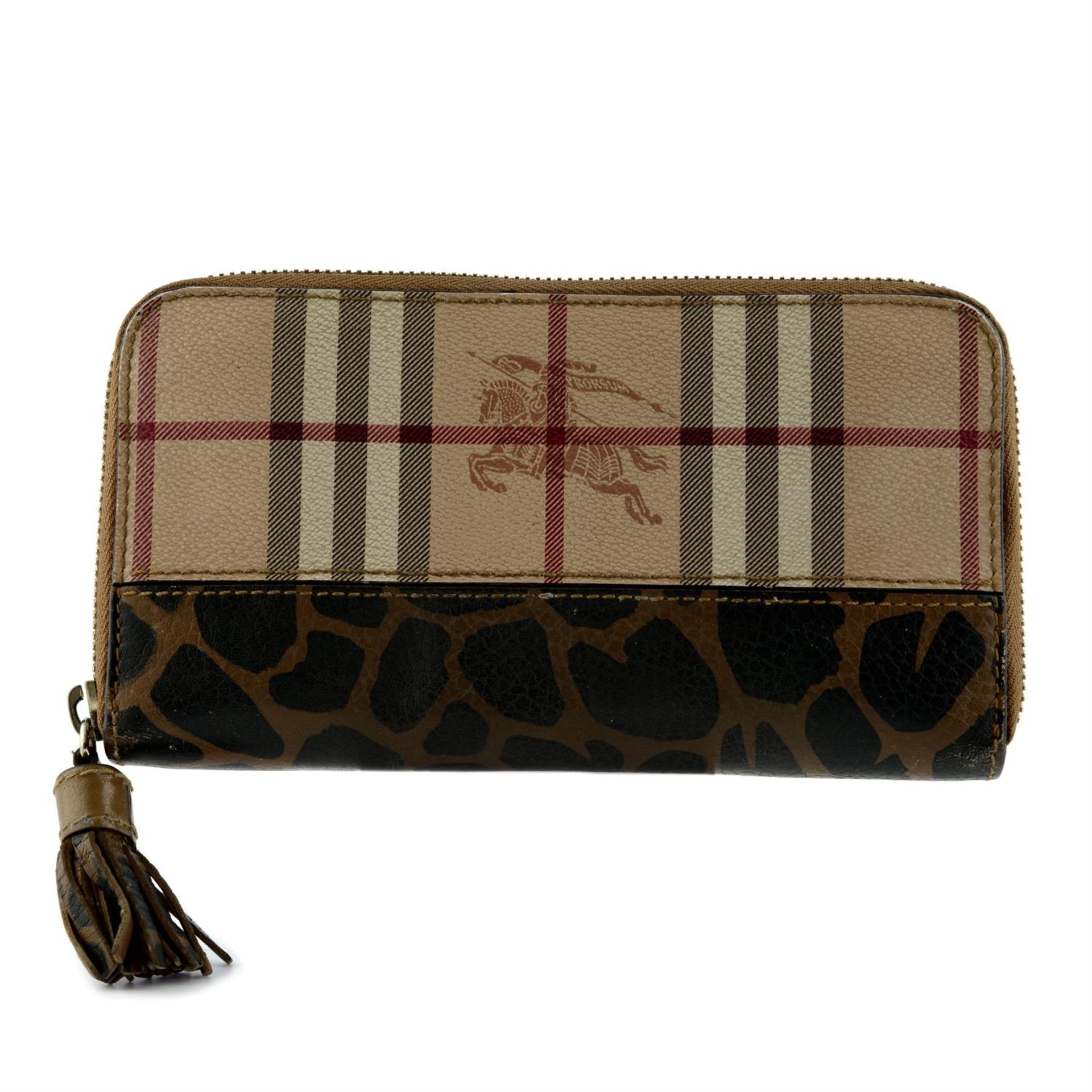 BURBERRY - A Horseferry check and leopard print leather zippy wallet.