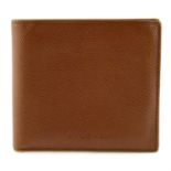 BULGARI - a brown leather wallet.