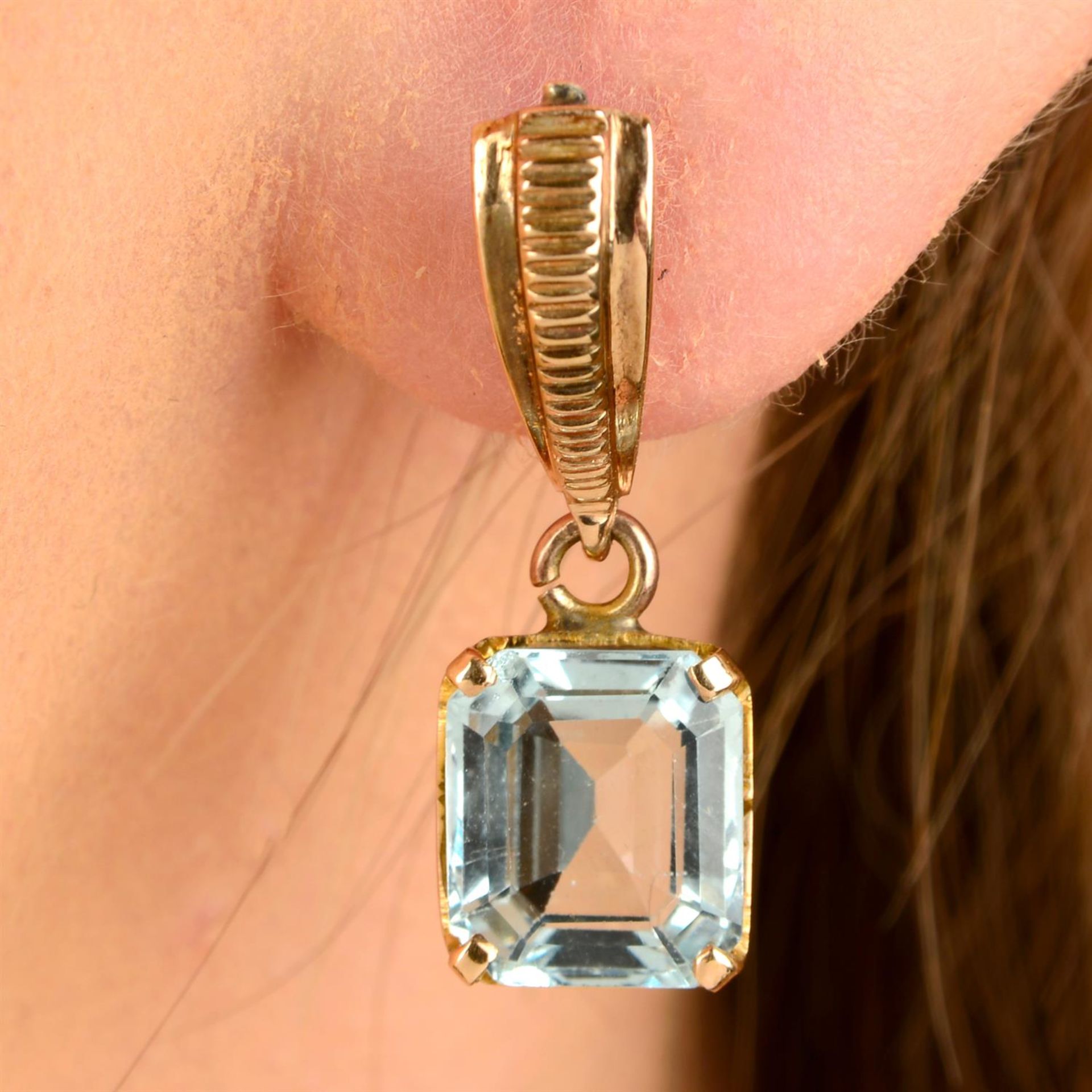 A pair of aquamarine drop earrings.