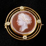 A late 19th century 15ct gold sardonyx cameo and diamond brooch, carved to depict Hera.