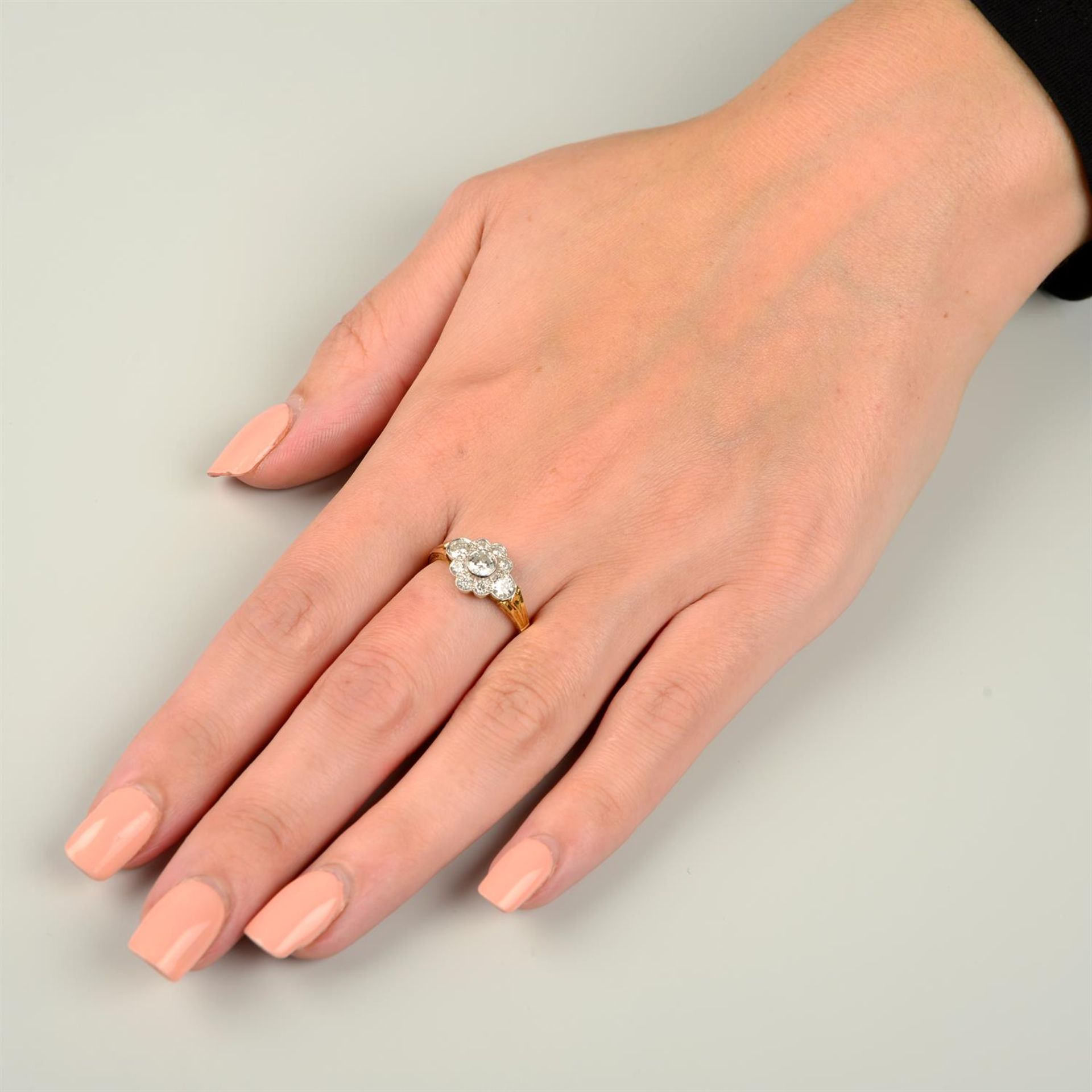 An 18ct gold brilliant-cut diamond cluster ring. - Image 5 of 5