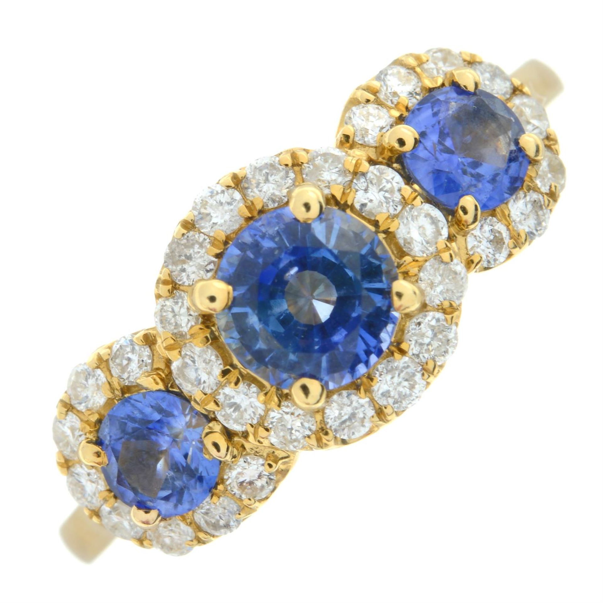 An 18ct gold graduated sapphire three-stone ring, with brilliant-cut diamond shared surround. - Bild 2 aus 5