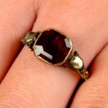 A Georgian silver and gold, foil-back garnet ring, with rose-cut diamond shoulders.