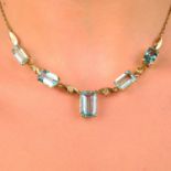 An aquamarine drop necklace.