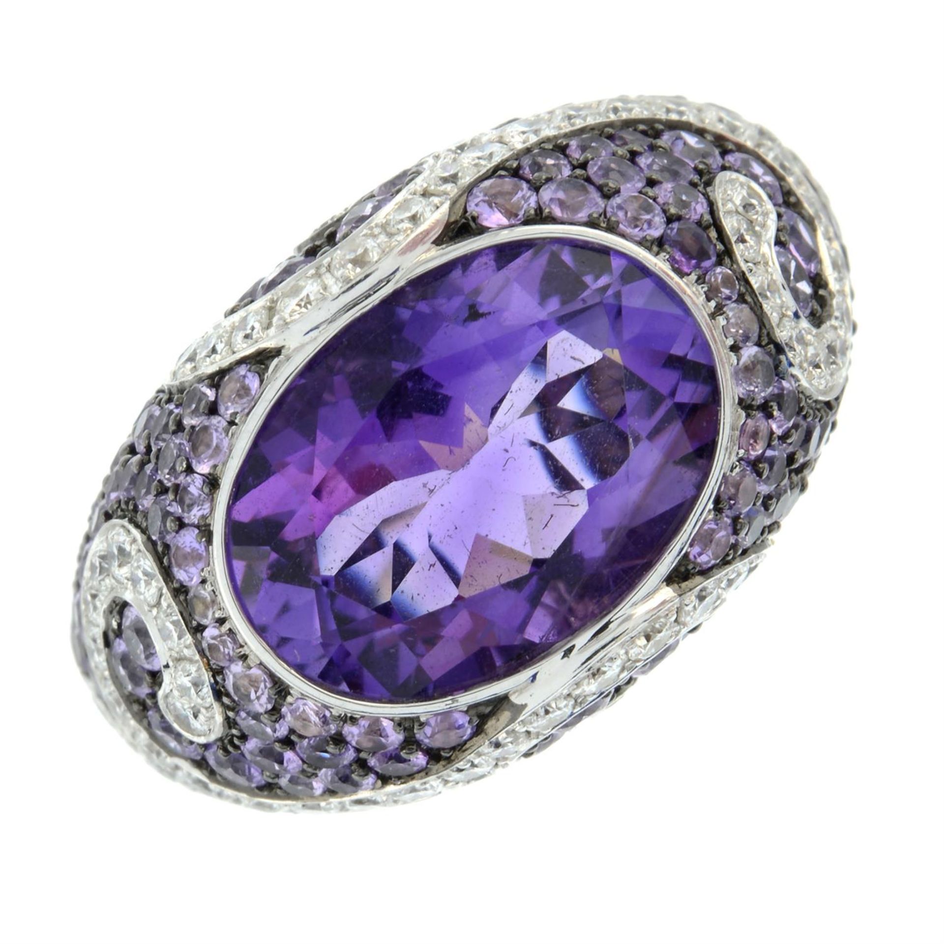 An amethyst, purple sapphire and brilliant-cut diamond dress ring. - Image 2 of 3