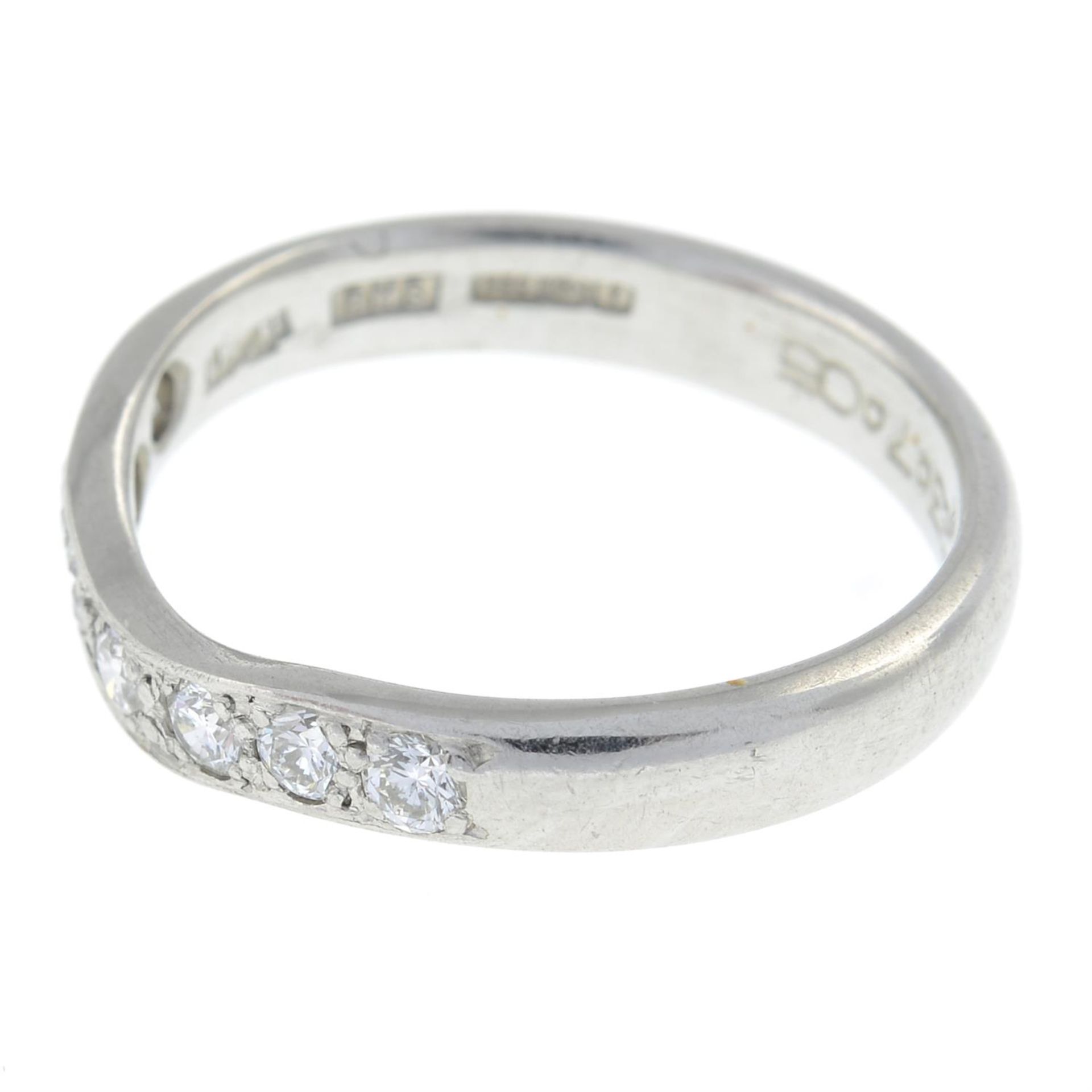 A platinum brilliant-cut diamond seven-stone shaped band ring. - Image 4 of 5