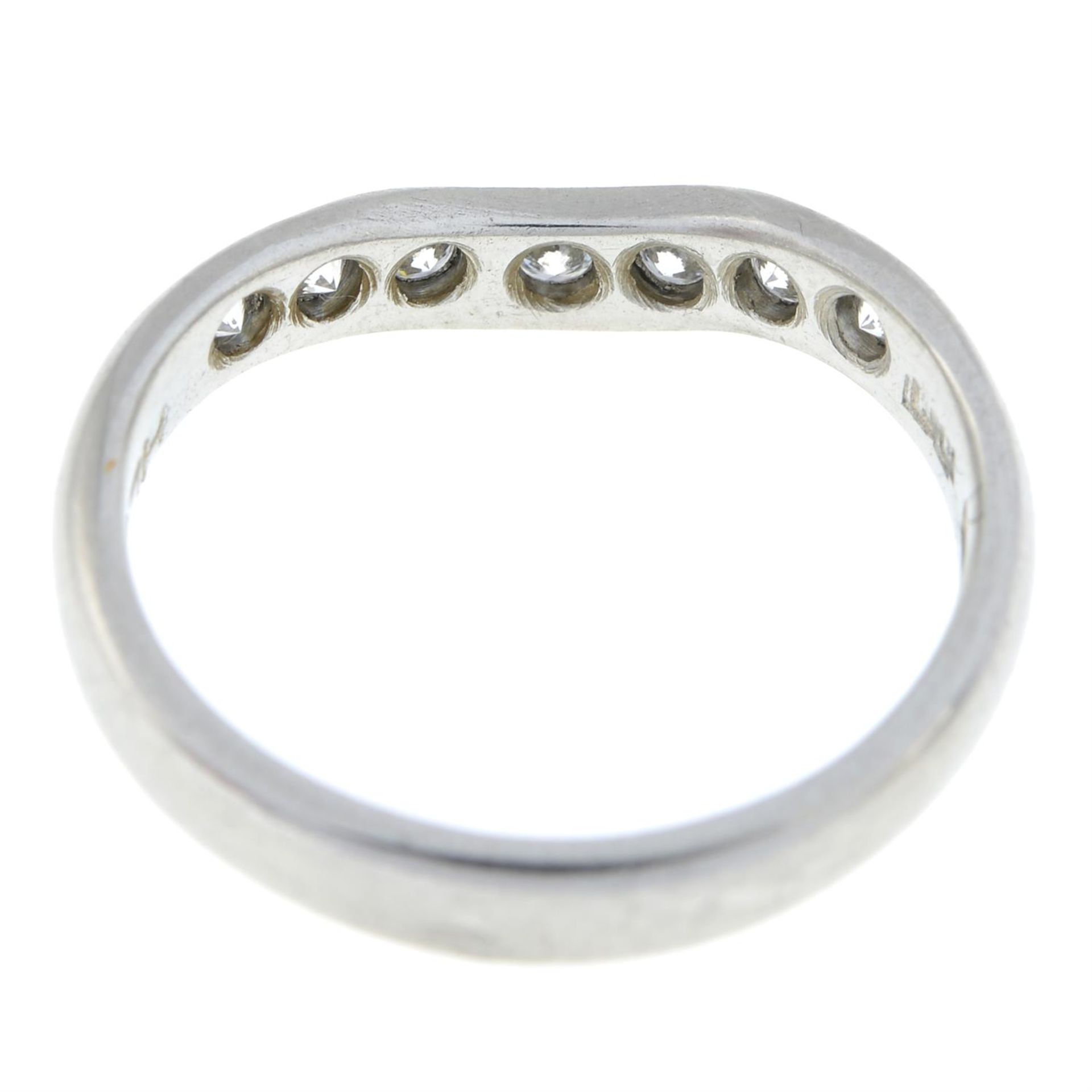 A platinum brilliant-cut diamond seven-stone shaped band ring. - Image 3 of 5