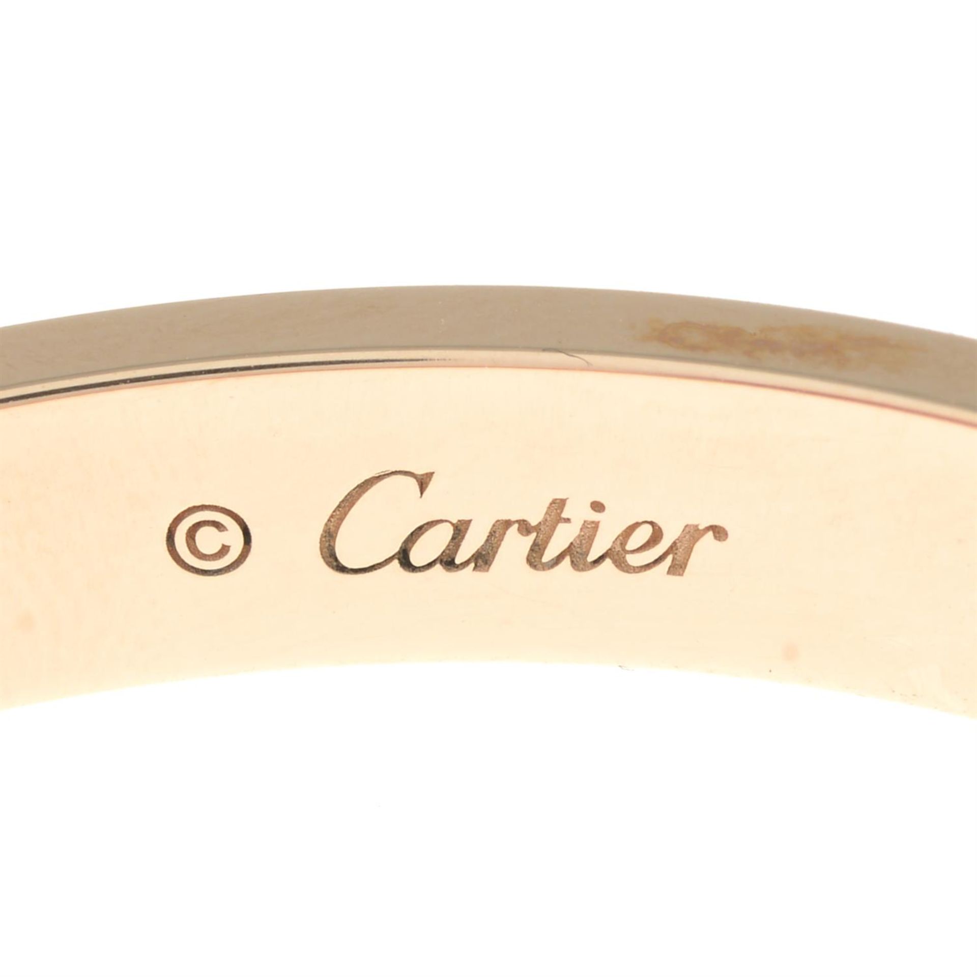 An 18ct gold brilliant-cut diamond 'Love' bangle, by Cartier. - Bild 4 aus 4