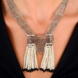 A brilliant-cut diamond, paste and seed pearl tassel necklace, with pressed glass component by Rene