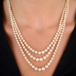An Edwardian graduated cultured pearl three-row necklace, with diamond clasp.