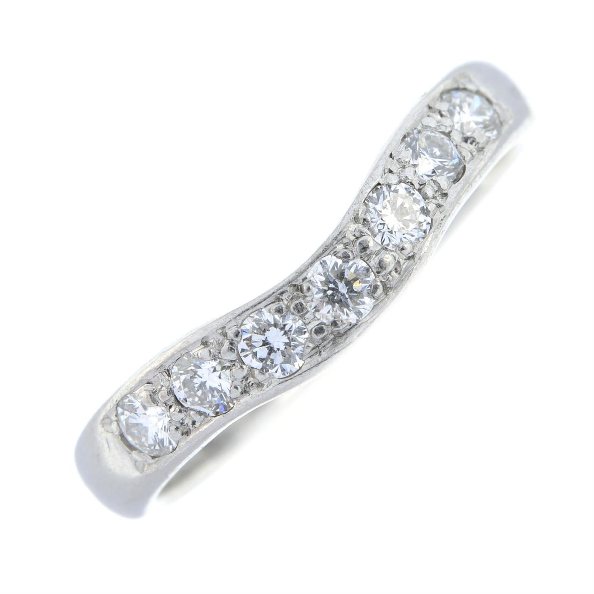 A platinum brilliant-cut diamond seven-stone shaped band ring. - Image 2 of 5