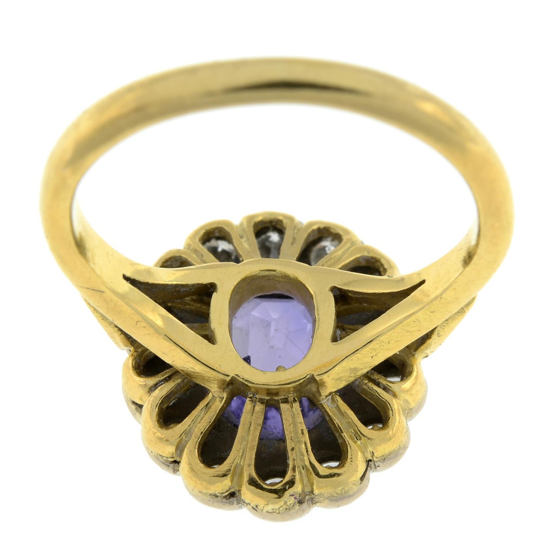 An 18ct gold Sri Lankan colour-change sapphire and brilliant-cut diamond cluster ring. - Image 3 of 5