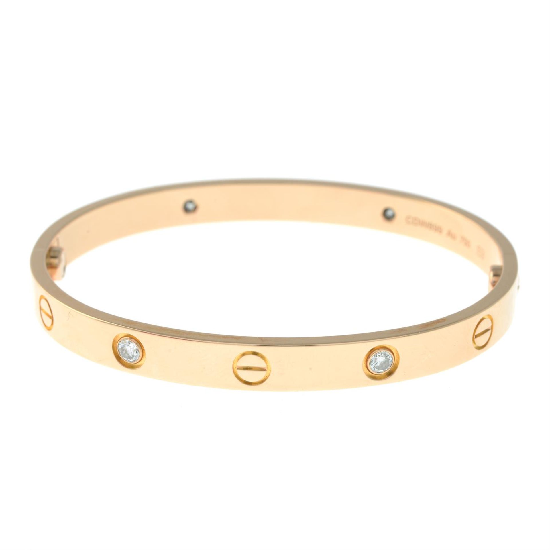 An 18ct gold brilliant-cut diamond 'Love' bangle, by Cartier. - Image 2 of 4