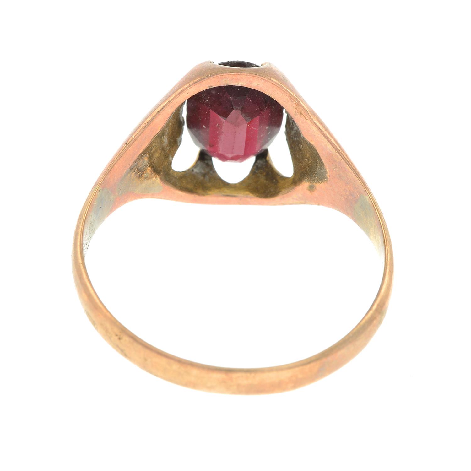 An early 20th century 9ct gold garnet single-stone ring. - Image 2 of 2