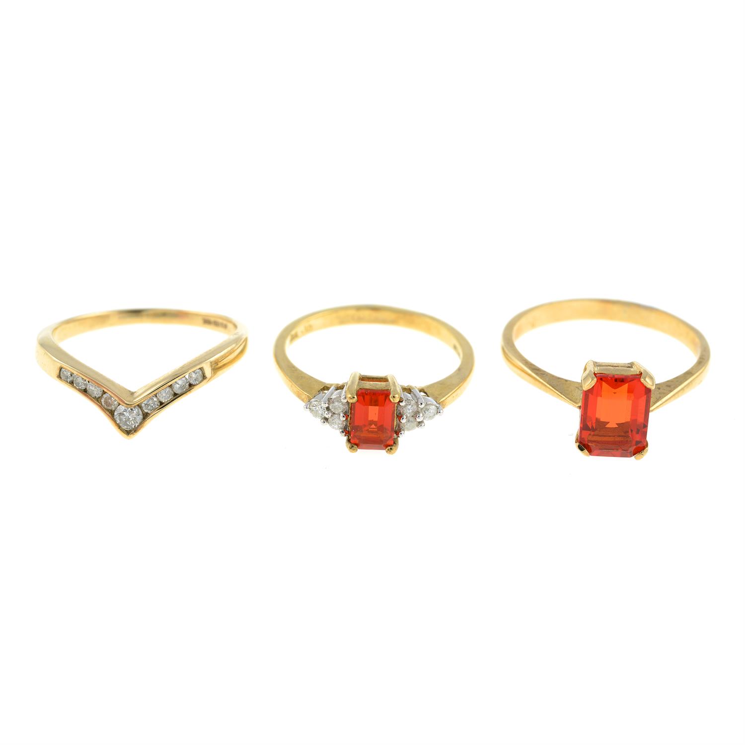 Three 9ct gold fire opal and diamond rings.
