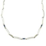 A 9ct gold polished link necklace, with diamond and blue gem spacers.