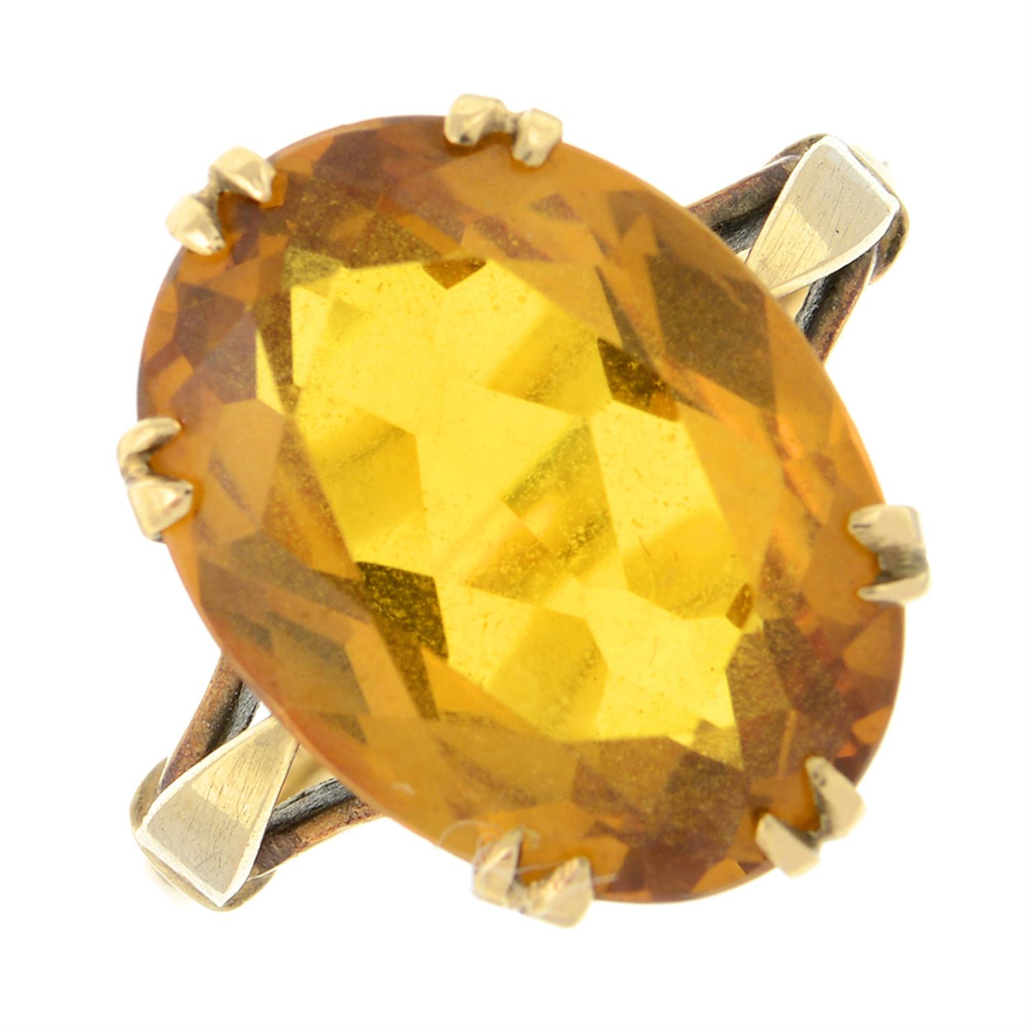 A citrine single-stone ring.