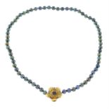 A cultured pearl single-strand necklace, with sapphire floral push-piece clasp.
