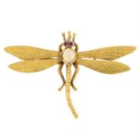 An opal and ruby dragonfly brooch.