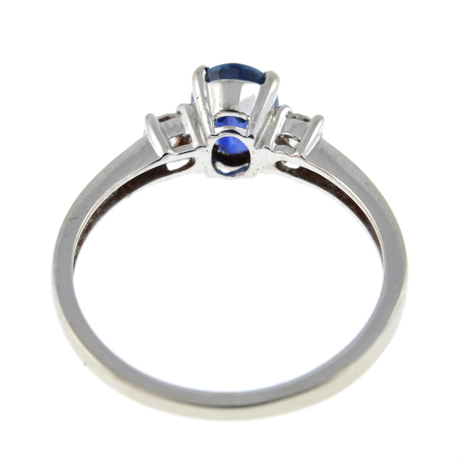 An 18ct gold sapphire and diamond three-stone ring. - Image 2 of 2