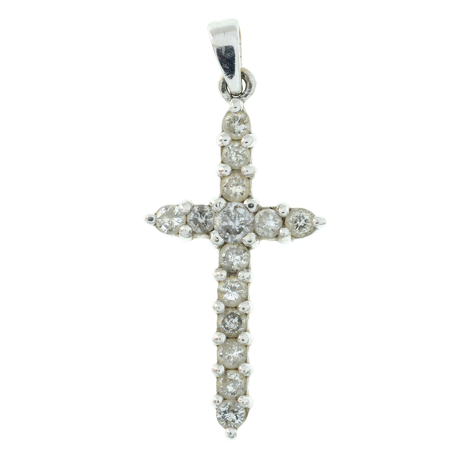 An 18ct gold diamond cross pendant.