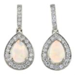 A pair of 18ct gold opal and brilliant-cut diamond cluster drop earrings.