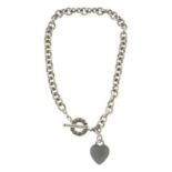 A silver 'Return to Tiffany' heart tag charm necklace, by Tiffany & Co.