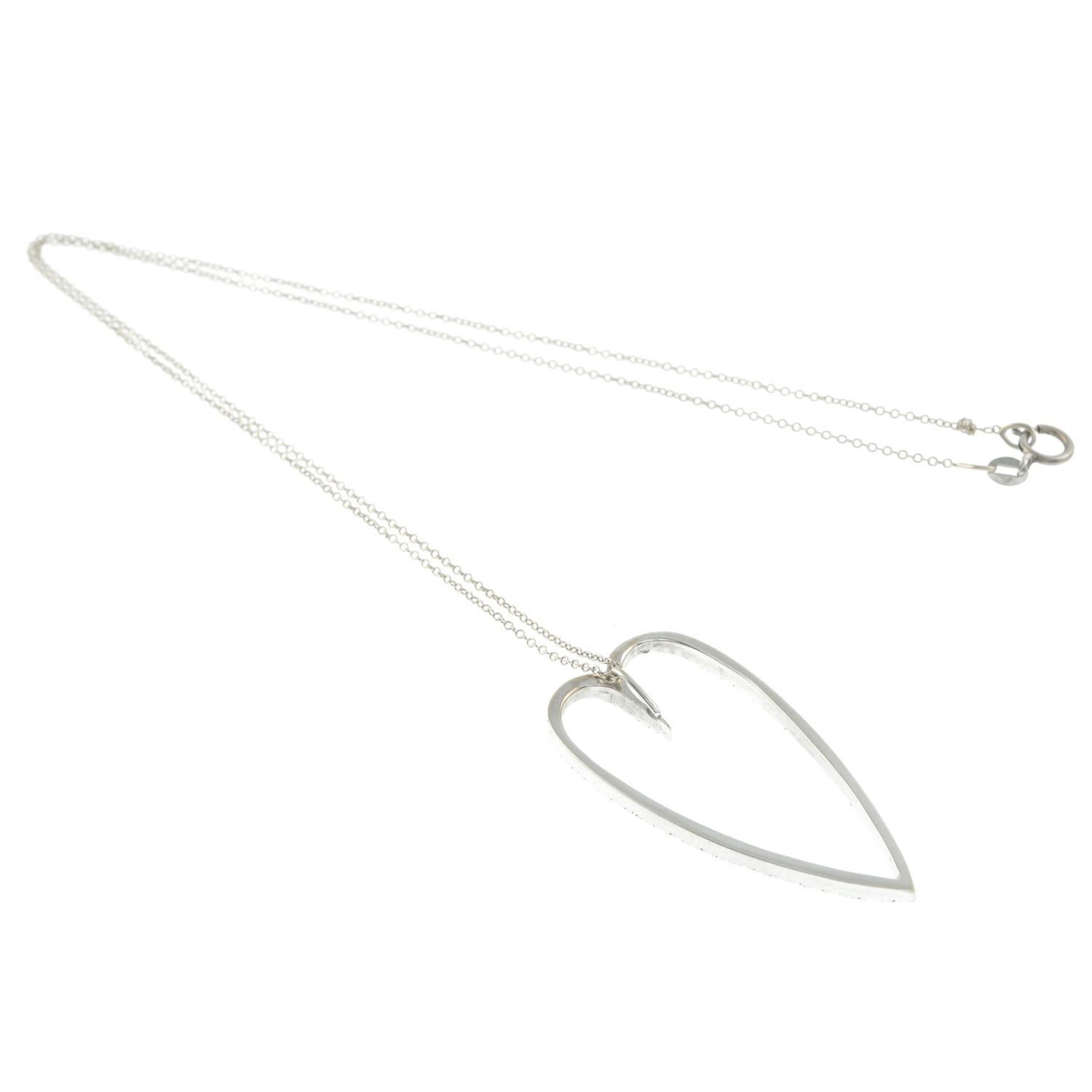 A diamond heart pendant, with trace-link chain. - Image 2 of 2