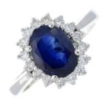 A sapphire and diamond cluster ring.