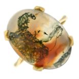 A 9ct gold moss agate cabochon ring.