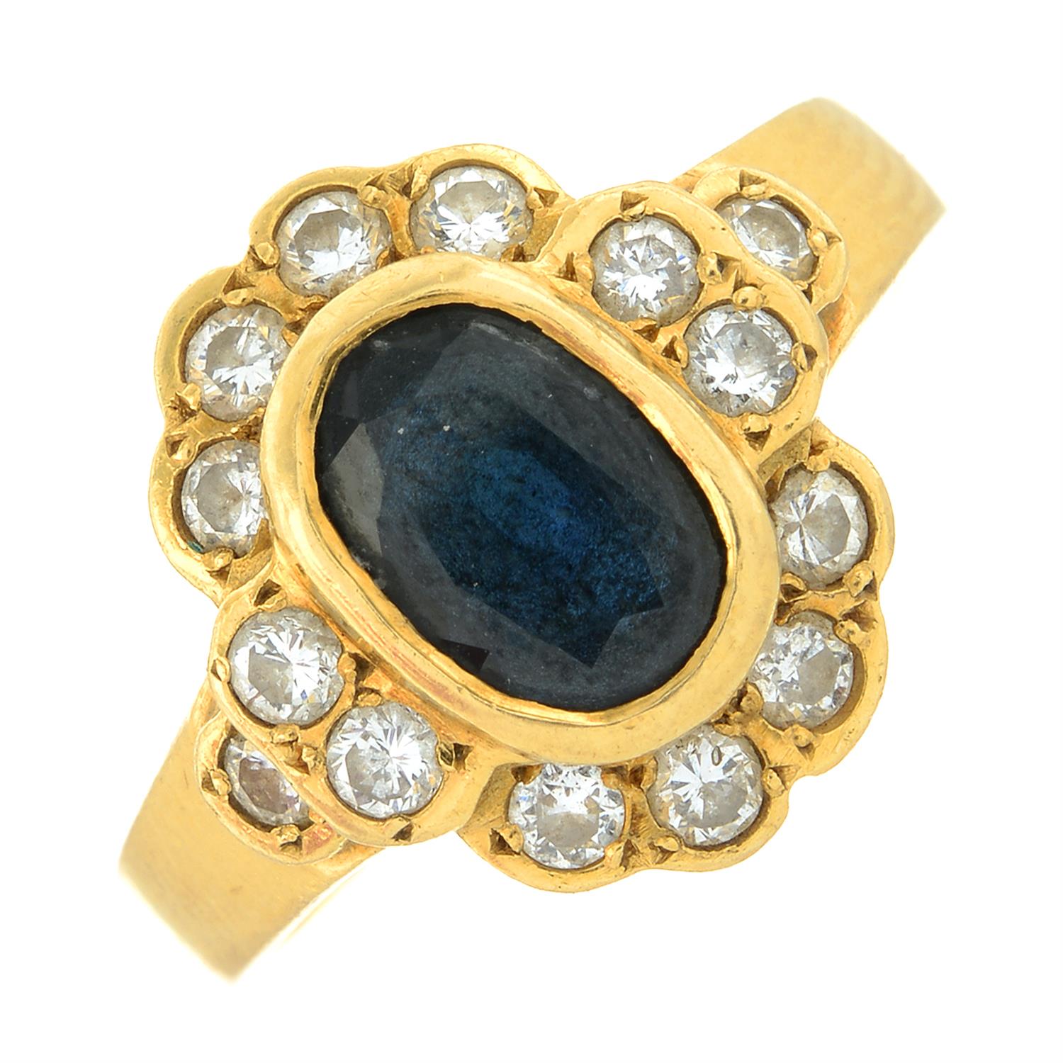 An 18ct gold sapphire and brilliant-cut diamond cluster ring.