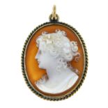 An early 20th century gold agate cameo doublet pendant.